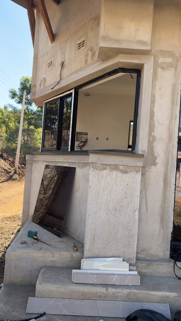 Frameless Corner Window